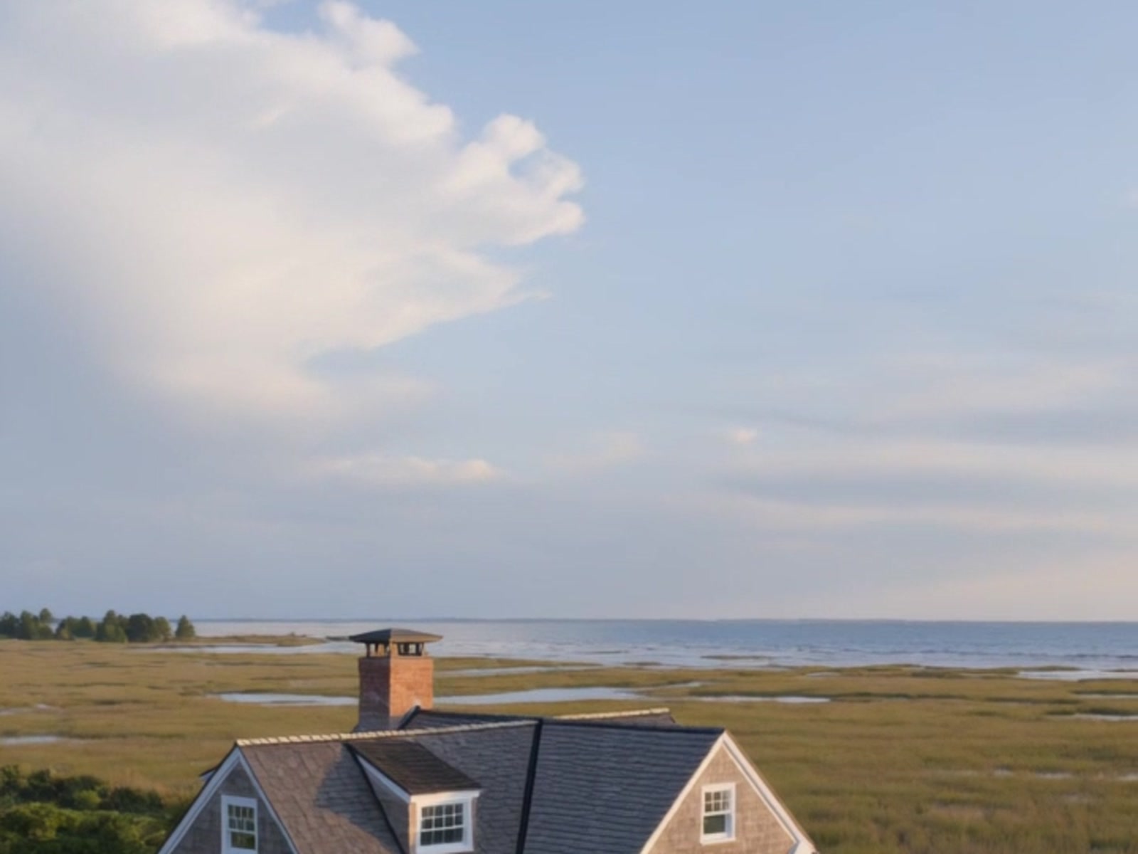 Coastal home exterior at golden hour